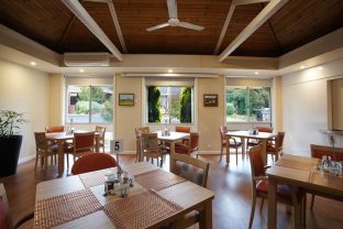Dining area and dining tables with a view of the outside.