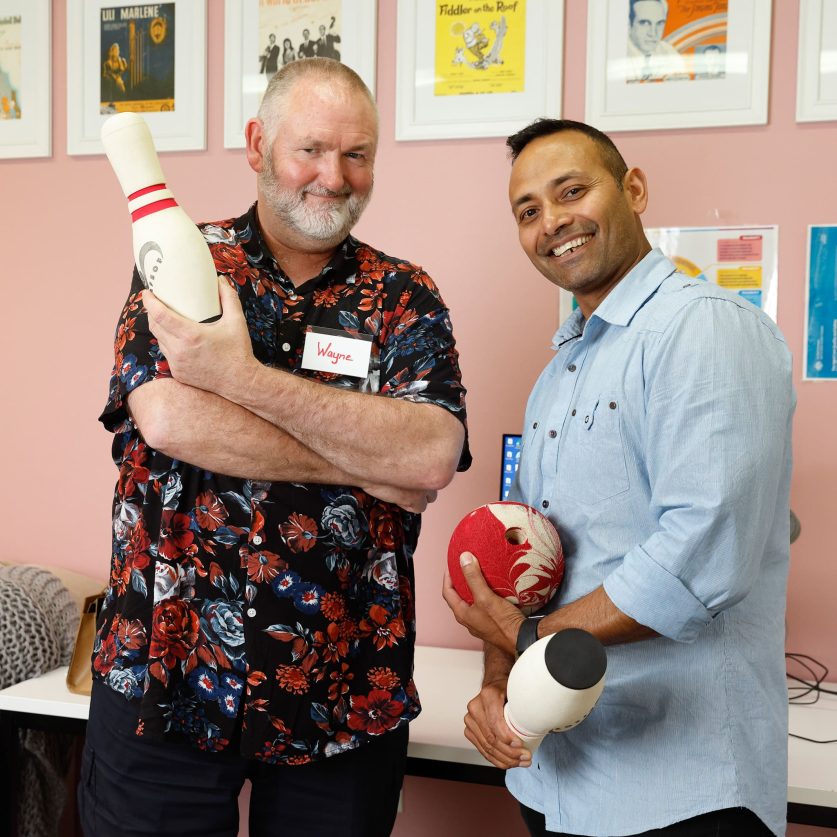 Forest Hill AgeWell Centre team member and customer are pictured with bowling equipments.