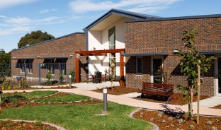 Latrobe Community, Strathdevon garden with lawn and seating is pictured.