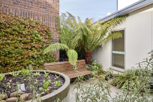 The garden area at Latrobe Community Strathdevon is captured with plants around the area.