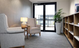 Reading nook and bookshelves at Hawthorn Community