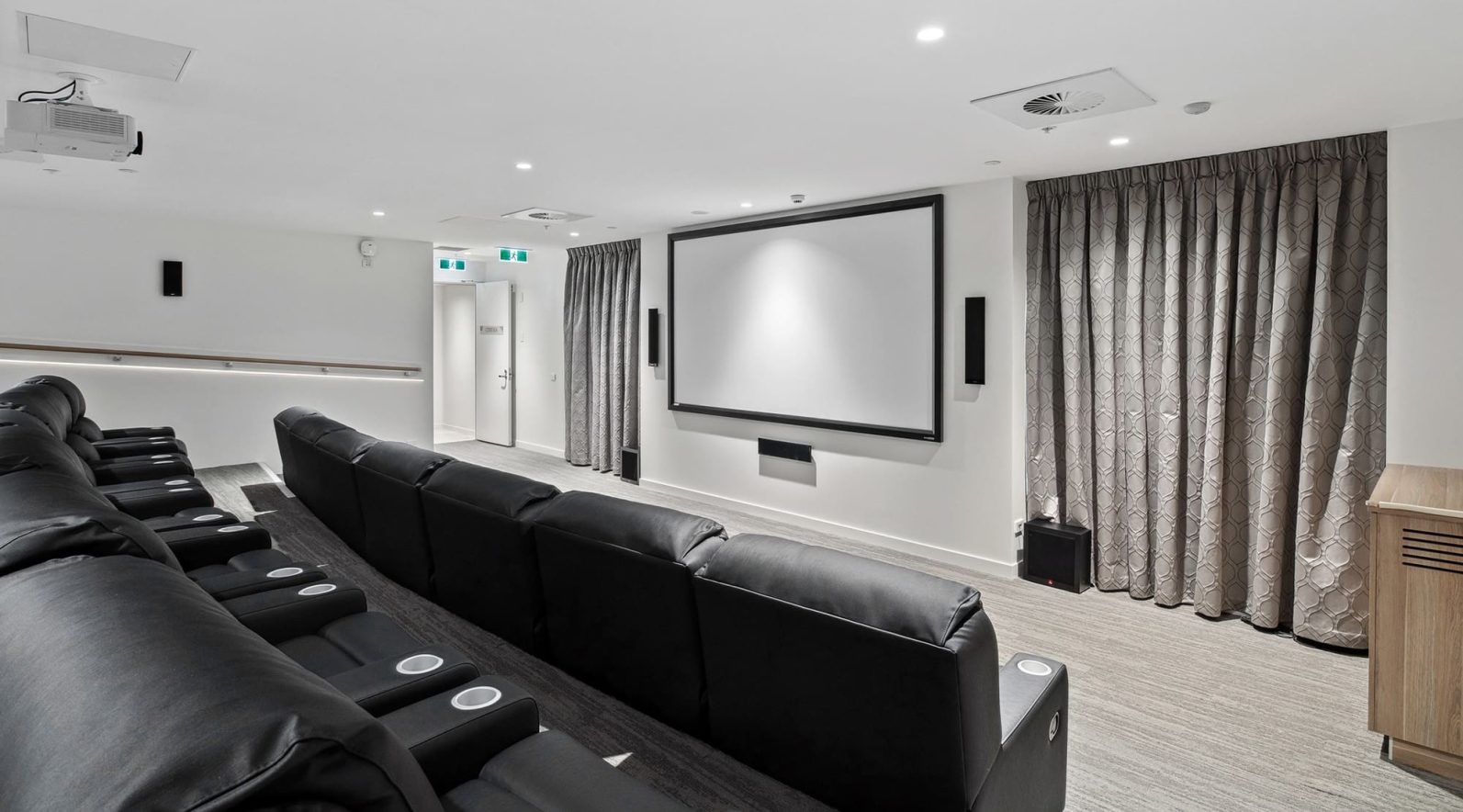 Cinema room with chairs pictured.