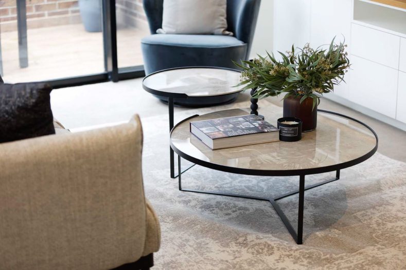 A close-up of the coffee table area in the living room.