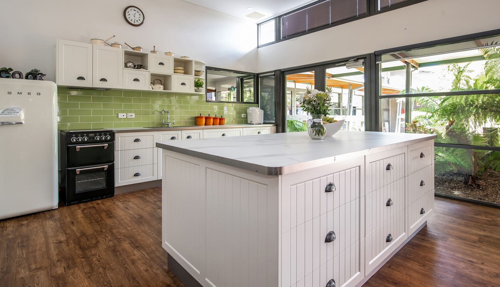 Newnham Community, Aldersgate Village communal kitchen with large kitchen island is pictured.