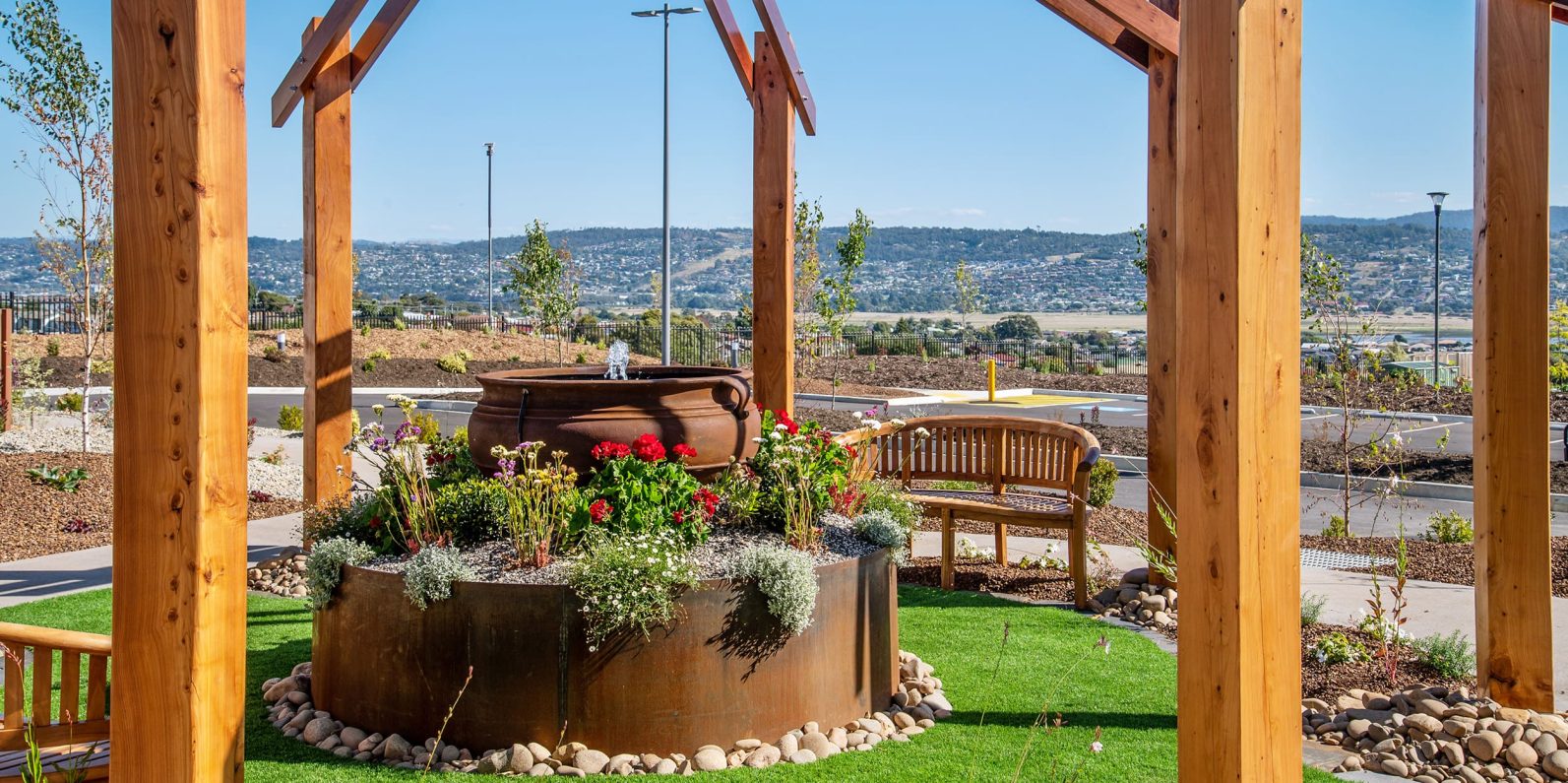 Garden with flowers and view of Tamar Valley.
