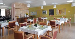 Dining room with well-presented tables
