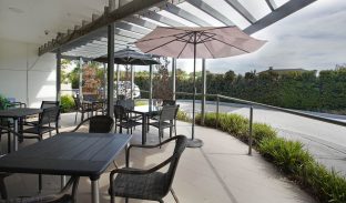 Undercover outdoor tables and chairs.