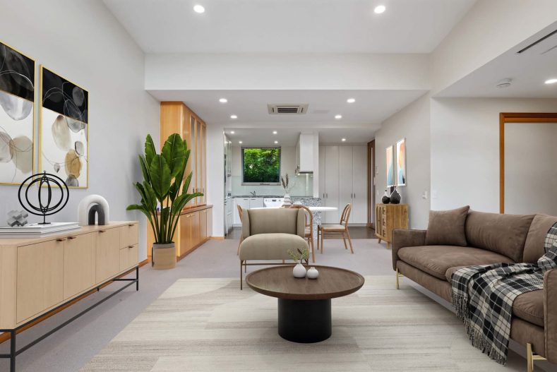 The living space is featured with seating areas.