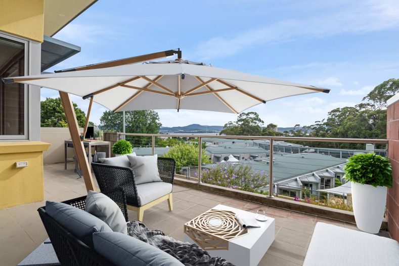 The balcony area offers seating area and a view of the surrounding.