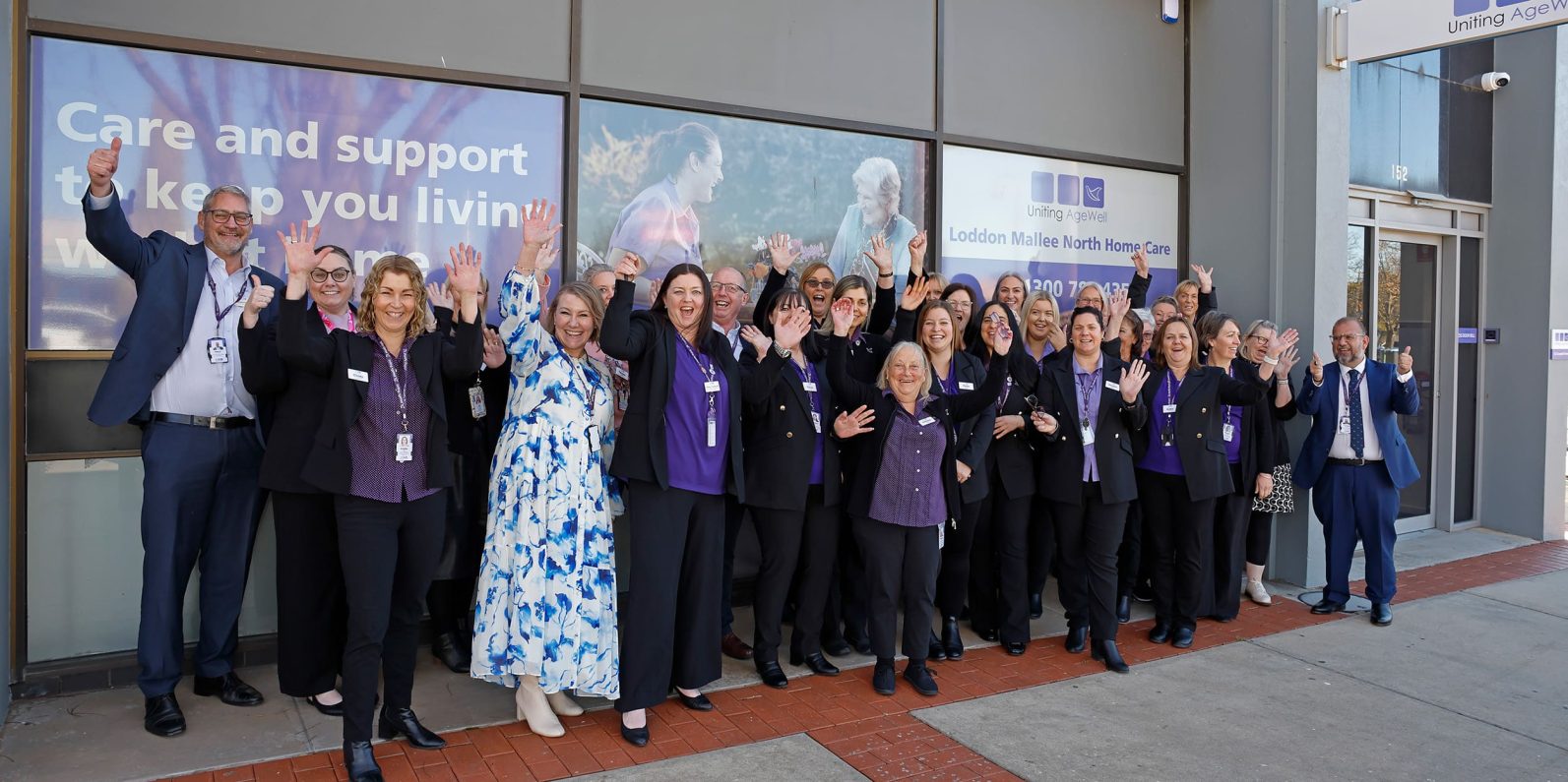 A group of Uniting AgeWell employees are photographed in front of the brand new Swan Hill Home Care office.