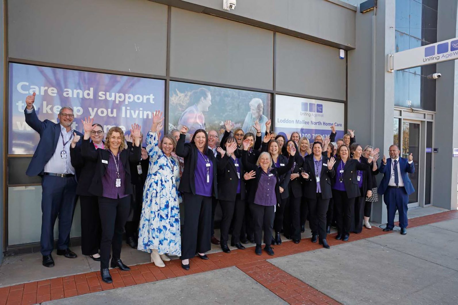 A group of Uniitng AgeWell employees are photographed in front of the new office in Swan Hill.