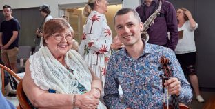 Resident with member of the Tasmanian Symphony Orchestra.