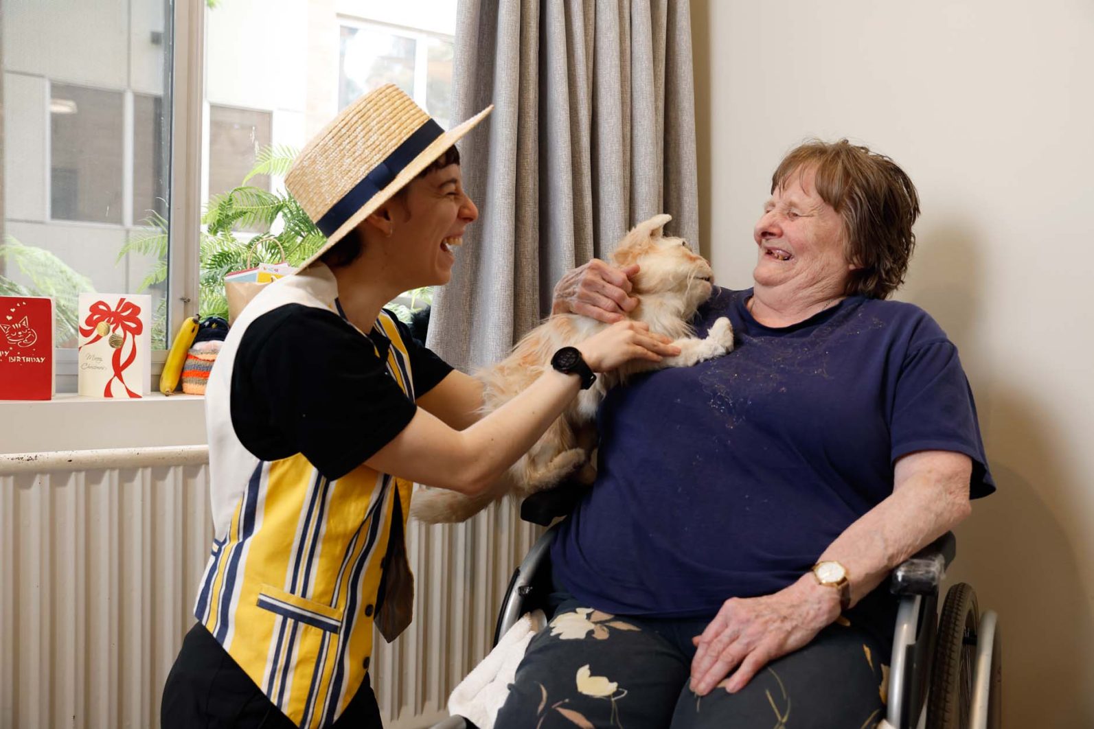 Resident enjoys a puppet show