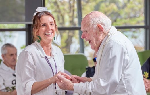 Lifestyle coordinator and resident dancing.