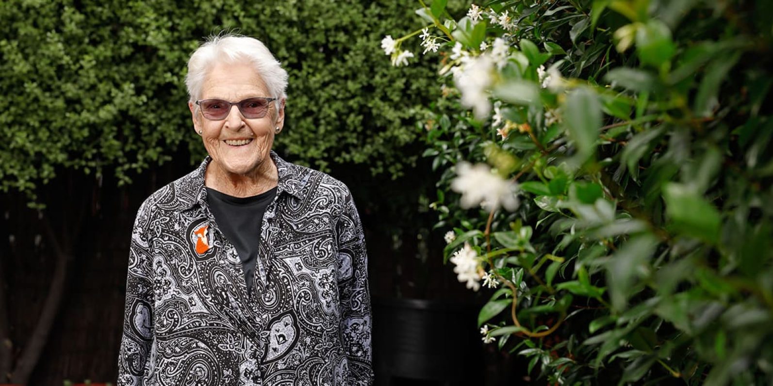 Portrait of person in garden.