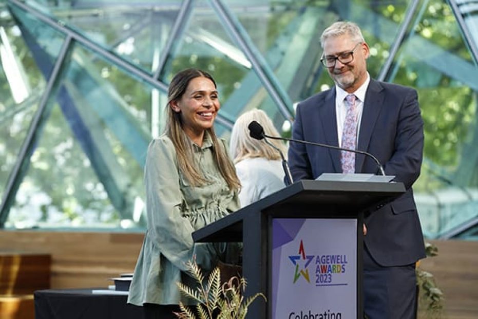 Two people on stage.