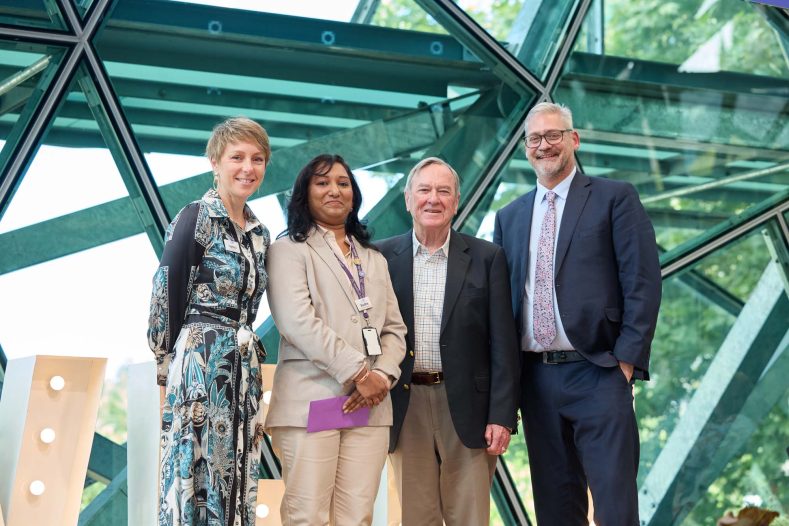 Residential Service Manager Sudha Maridu receives the scholarship