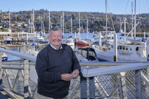 Steve Wright, a Uniting AgeWell Home Care customer in Tasmania is photographed by the harbour.