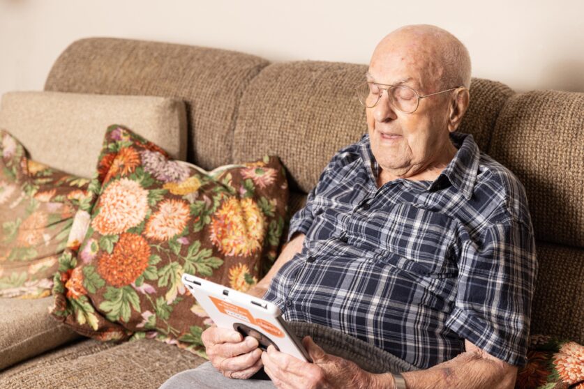 A person is looking at a tablet