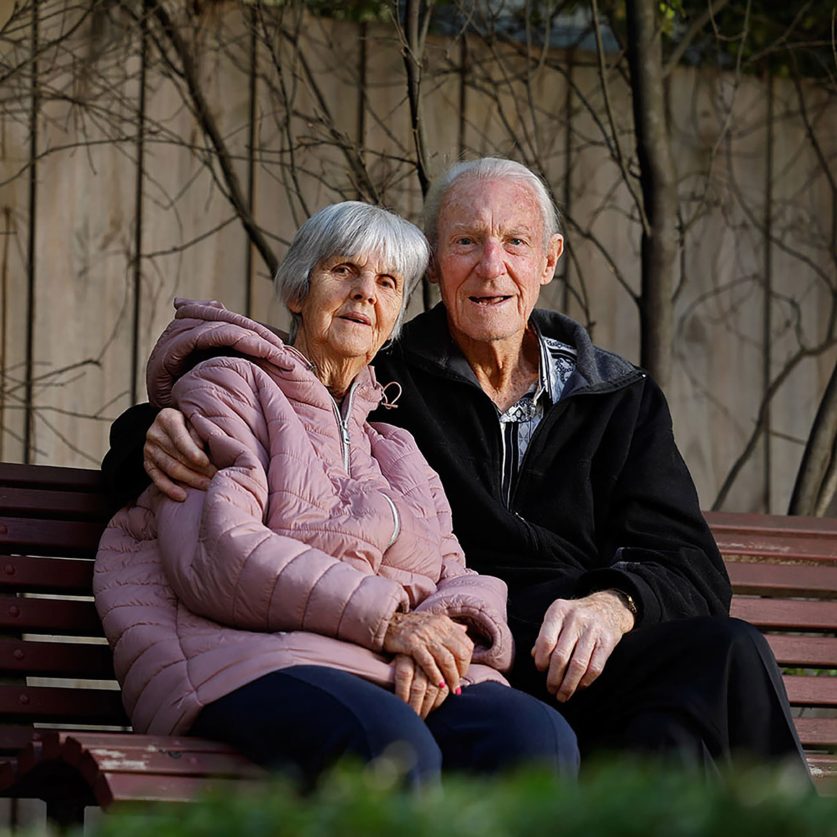 Customers pictured sitting on a bench.